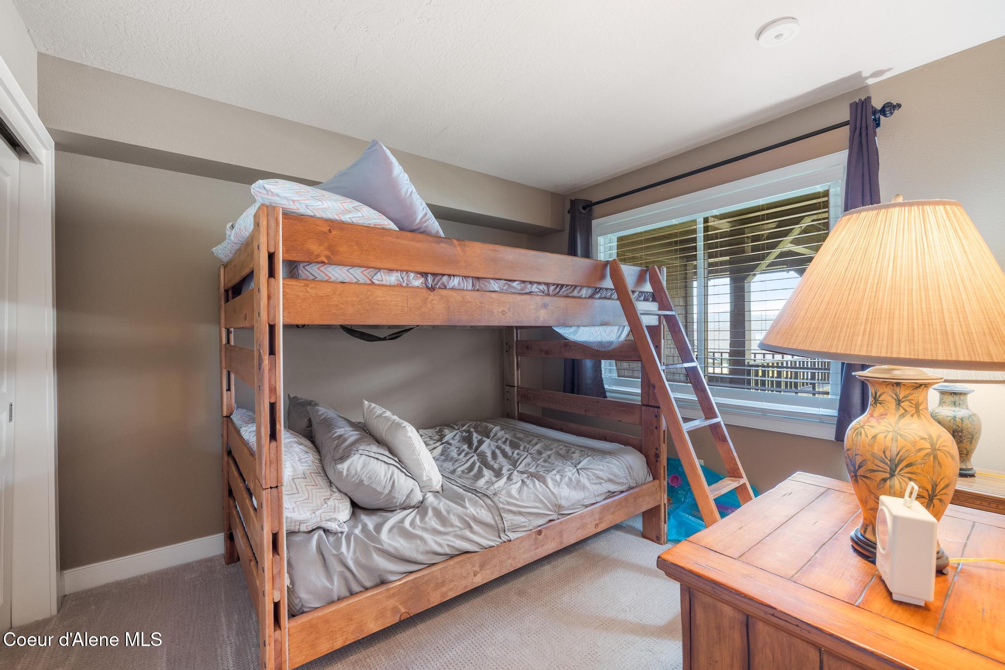 4549 South Arrow Point Drive, Unit 207 Harrison, ID 83833 - Photo 27 of 60 Guest Bed 2