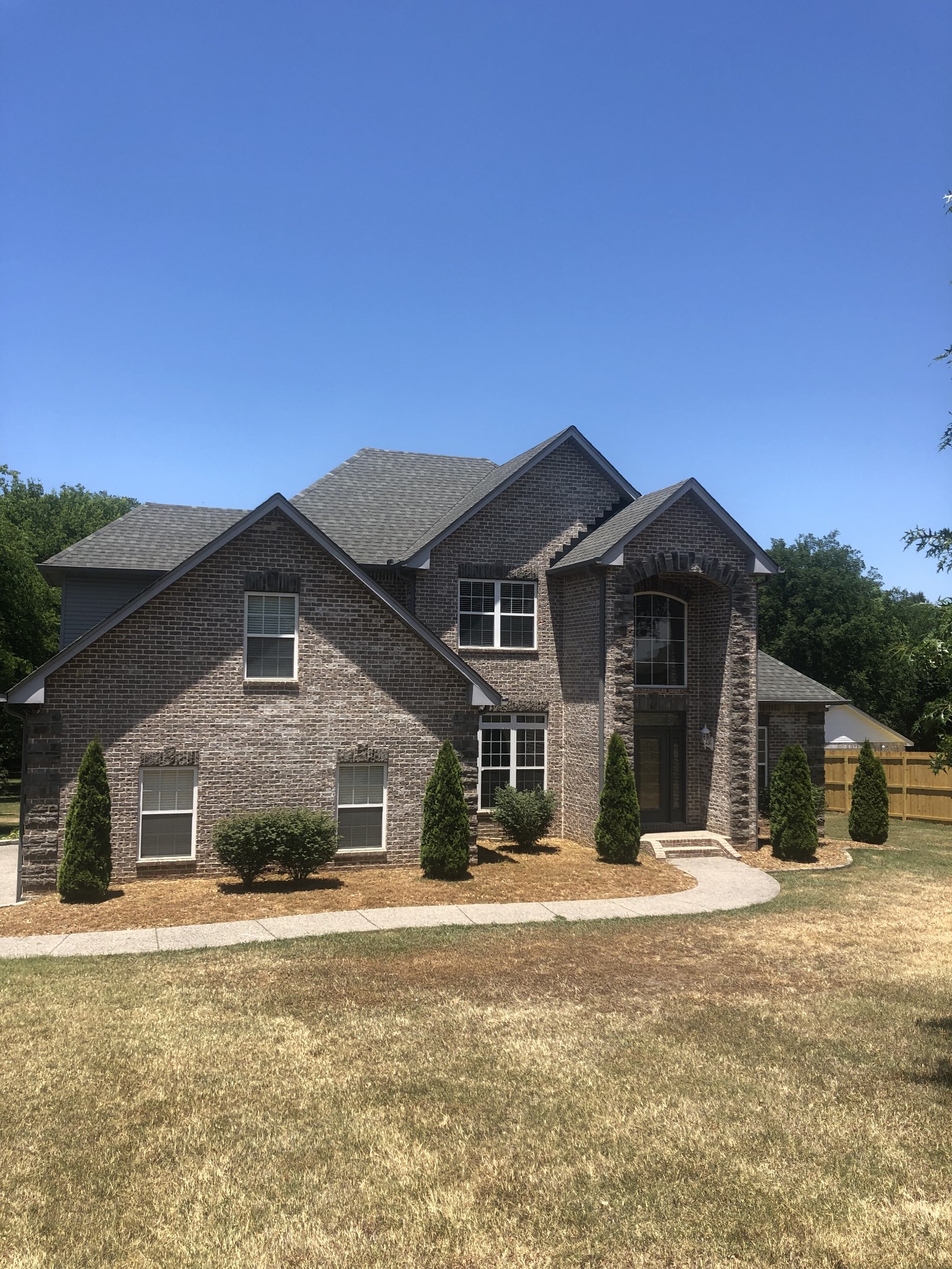 242 Ridgewater Way Mount Juliet, TN 37122 - Photo 1 of 24 a front view of a house with a yard