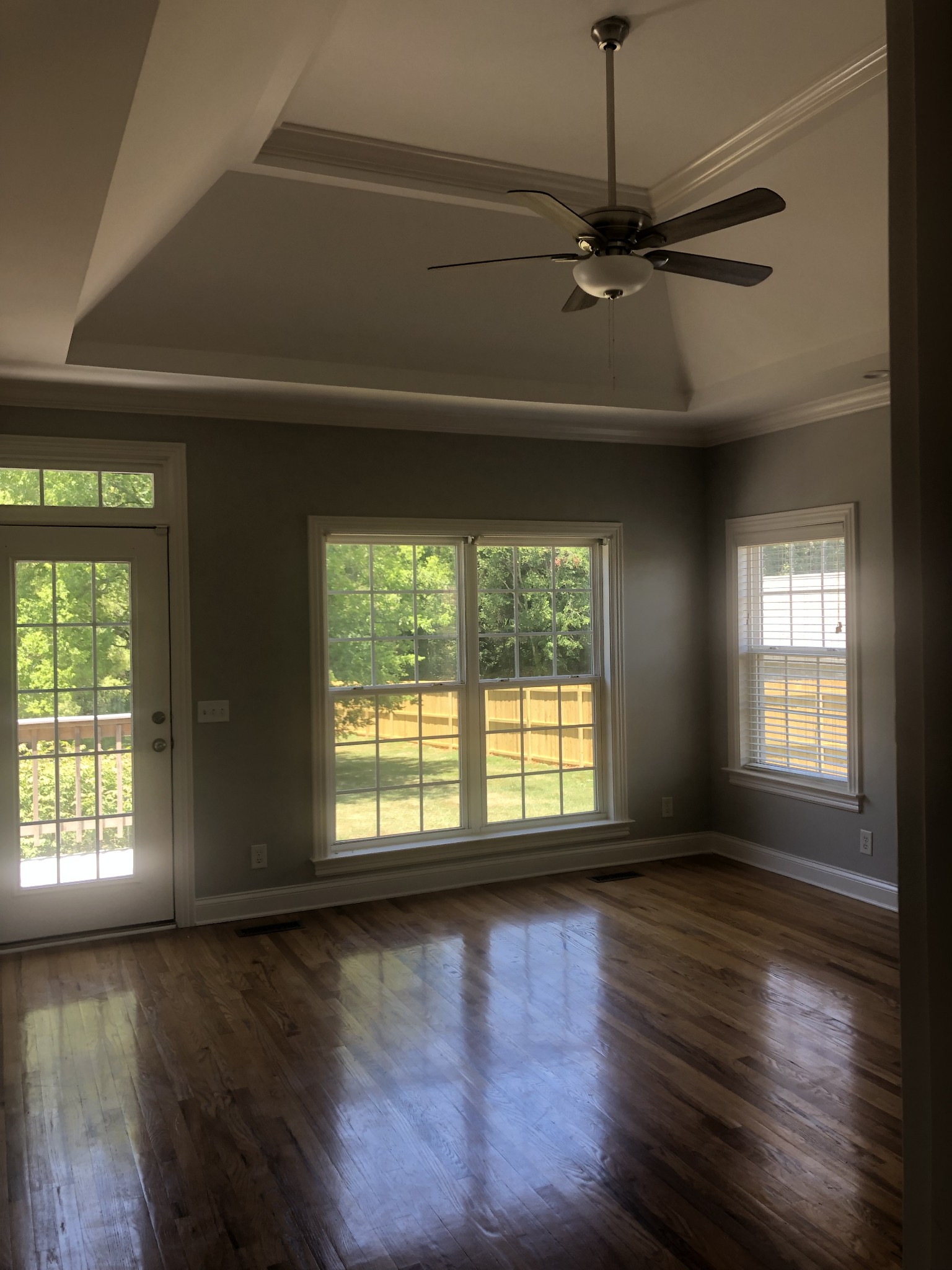 242 Ridgewater Way Mount Juliet, TN 37122 - Photo 19 of 24 an empty room with wooden floor fan and windows
