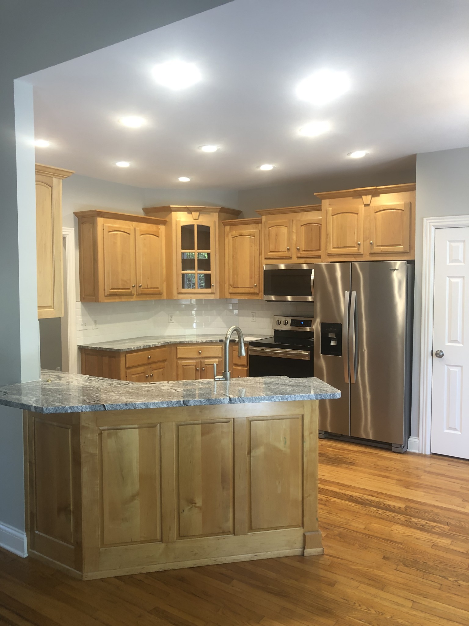 242 Ridgewater Way Mount Juliet, TN 37122 - Photo 21 of 24 a kitchen with stainless steel appliances granite countertop a sink a stove a refrigerator a washer dryer and a refrigerator