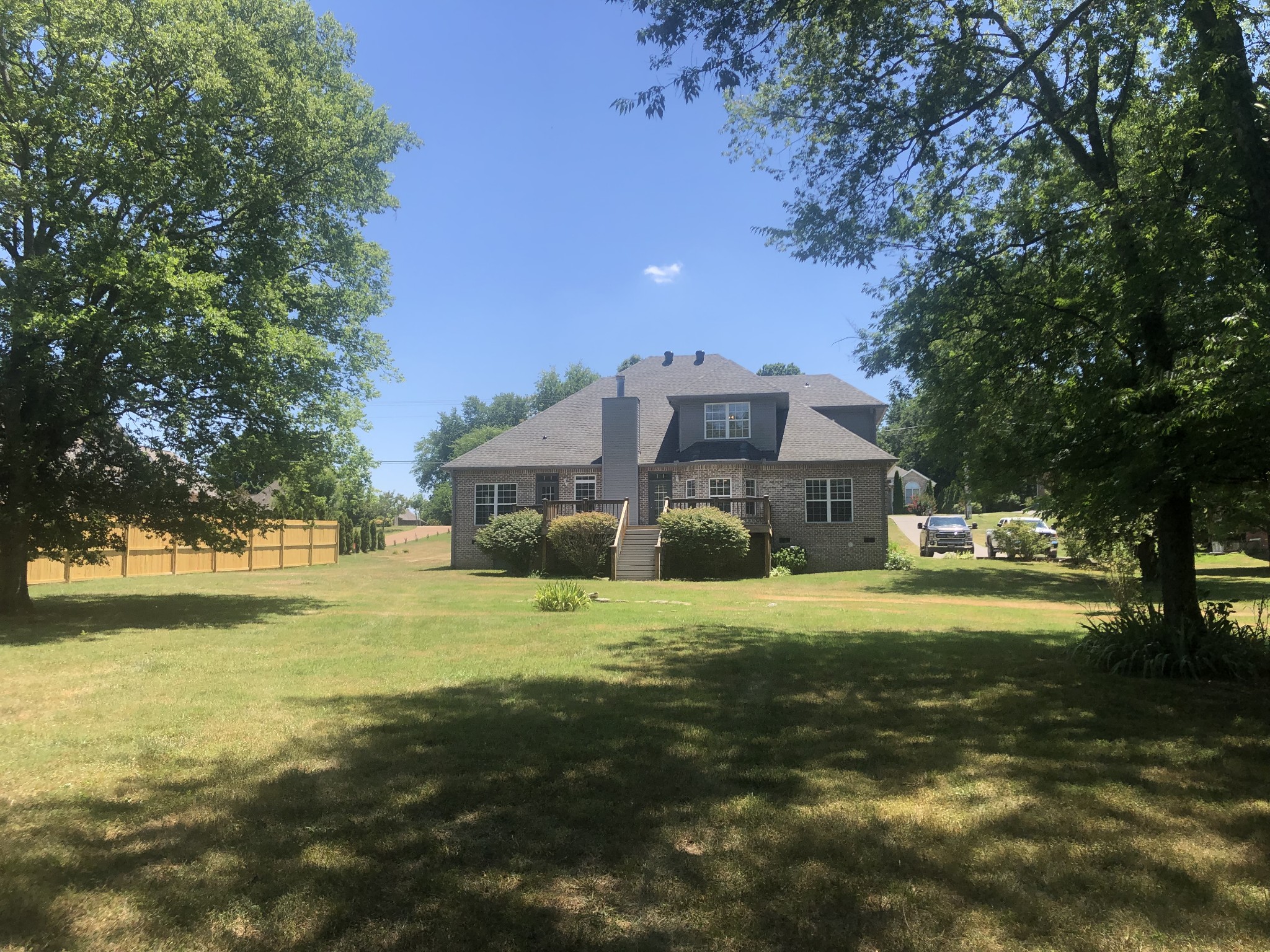 242 Ridgewater Way Mount Juliet, TN 37122 - Photo 4 of 24 a front view of a house with a big yard
