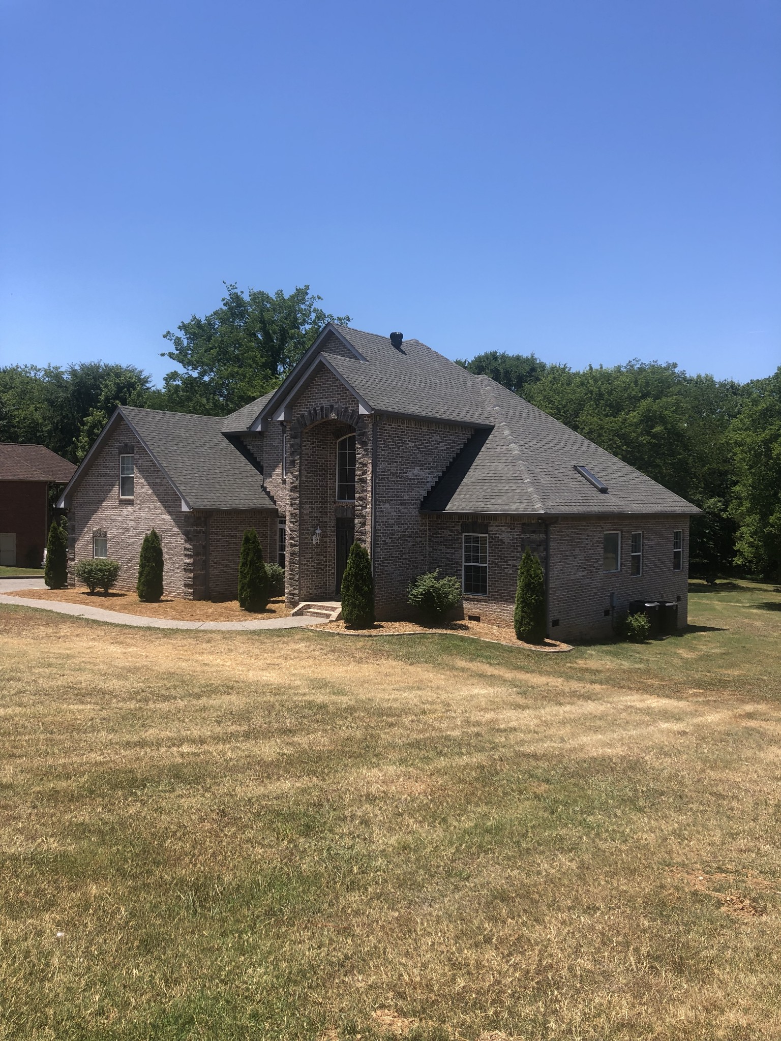 242 Ridgewater Way Mount Juliet, TN 37122 - Photo 9 of 24 a front view of a house with a yard