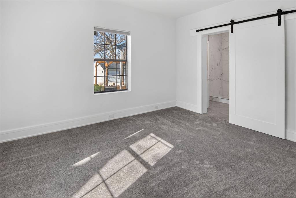 2218 Lynnhaven Road Fort Worth, TX 76103 - Photo 19 of 37 a view of an empty room with a window