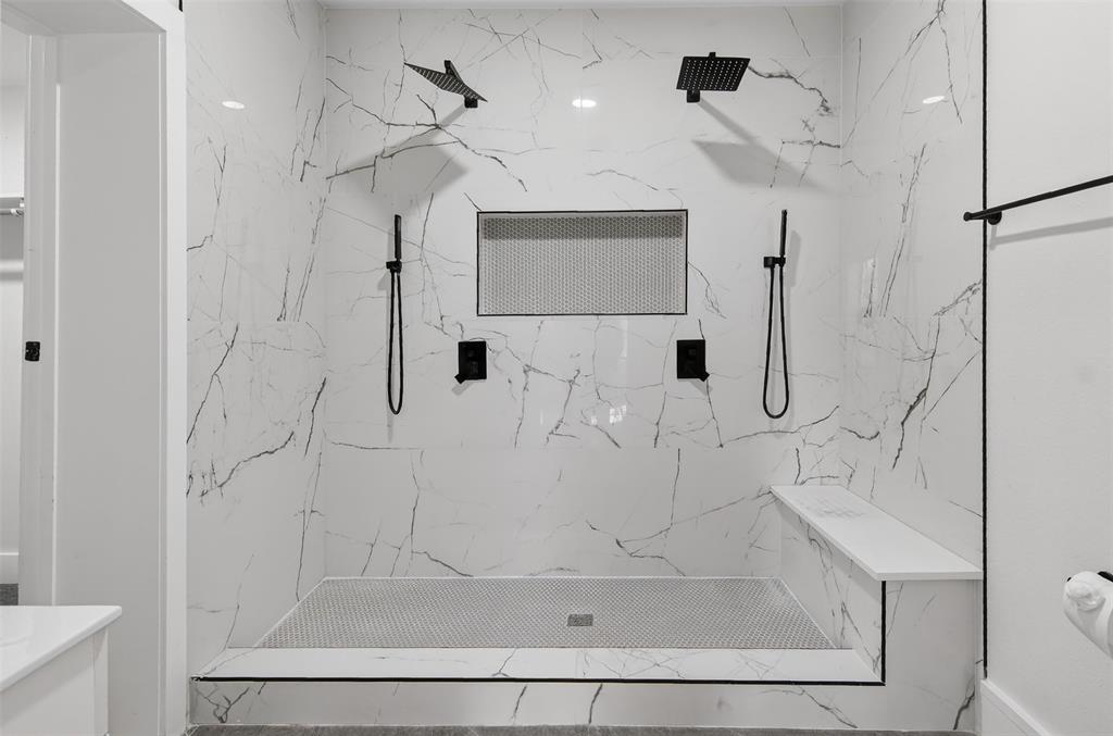 2218 Lynnhaven Road Fort Worth, TX 76103 - Photo 21 of 37 a bathroom with a shower