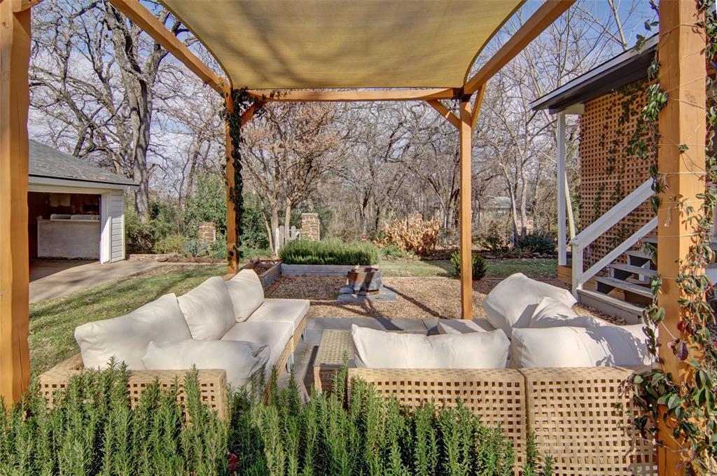 2218 Lynnhaven Road Fort Worth, TX 76103 - Photo 30 of 37 a view of a patio with couches chairs and a potted plant
