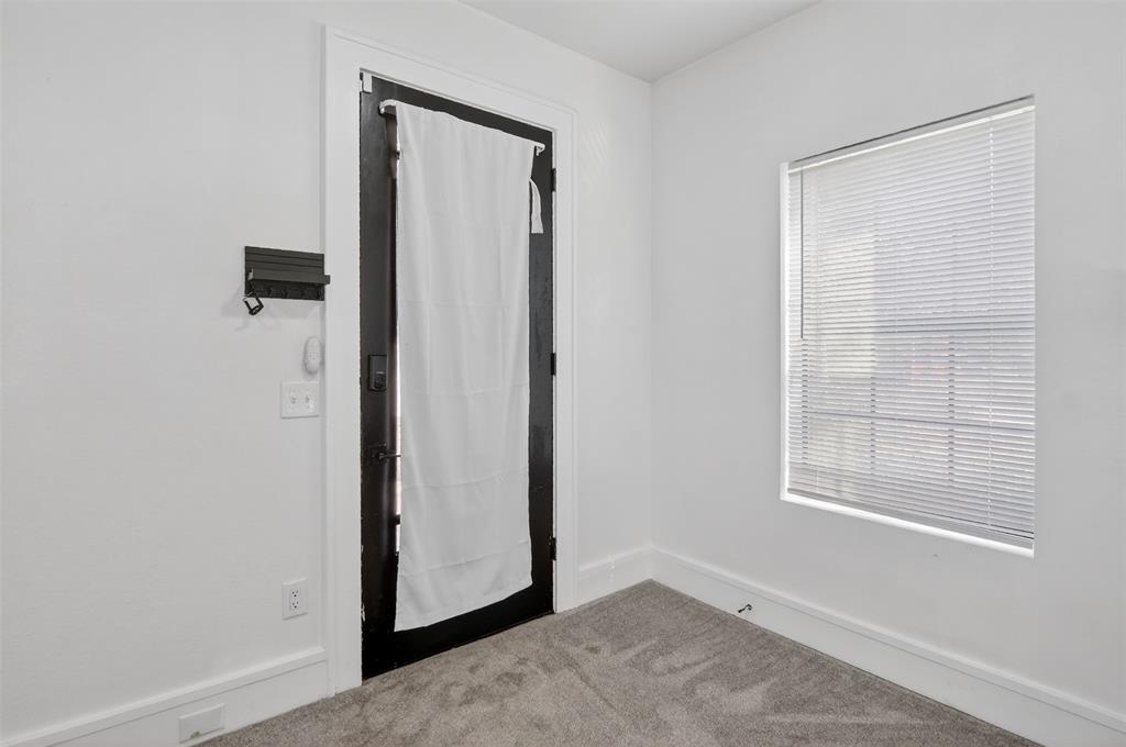 2218 Lynnhaven Road Fort Worth, TX 76103 - Photo 6 of 37 an empty room with windows