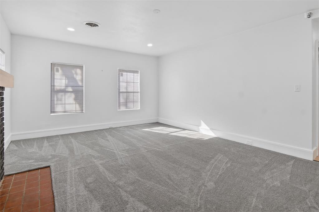 2218 Lynnhaven Road Fort Worth, TX 76103 - Photo 9 of 37 an empty room with windows