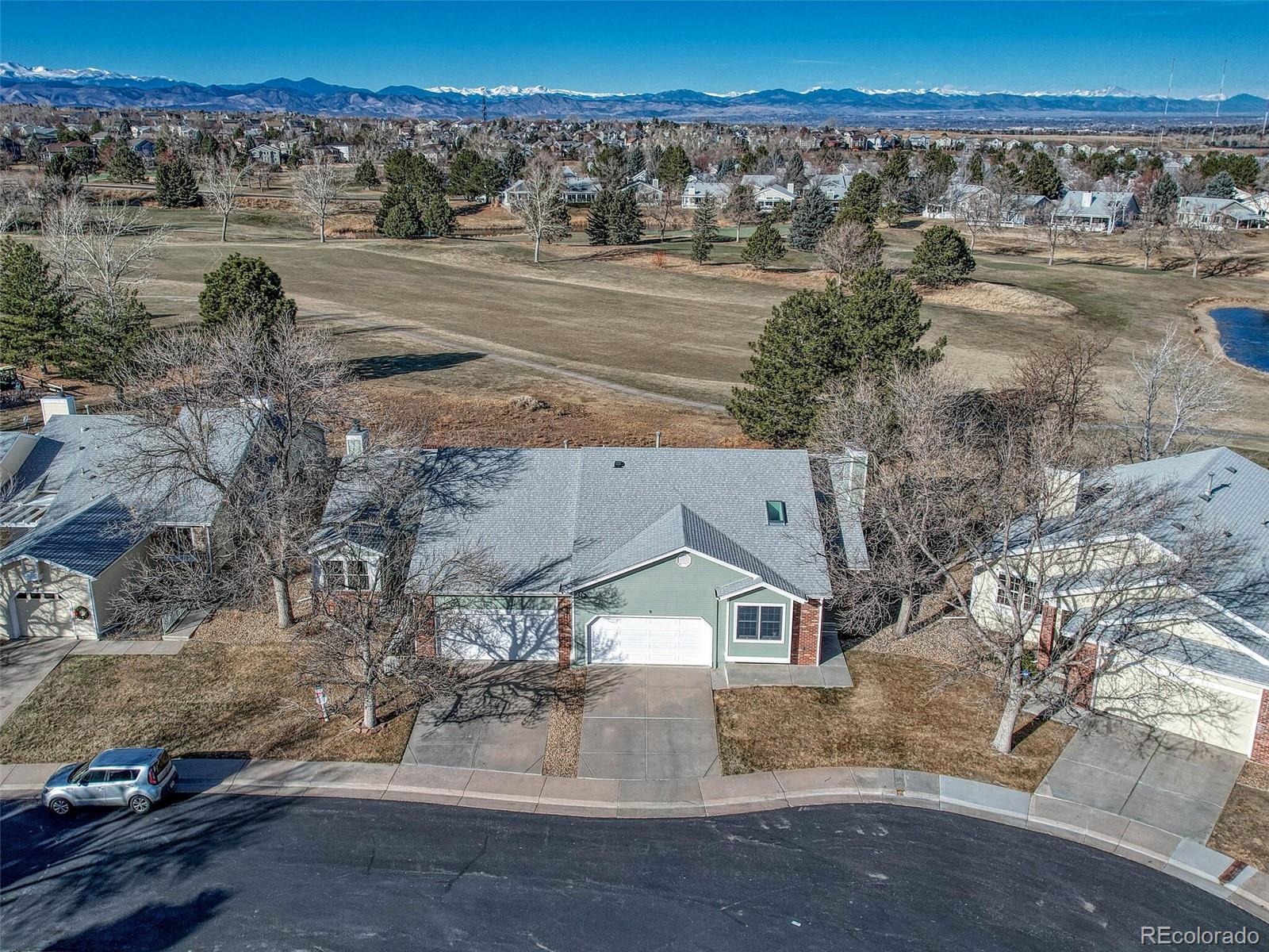 9 Stonehaven Court Highlands Ranch, CO 80130 - Photo 34 of 40 an aerial view of a house with a yard