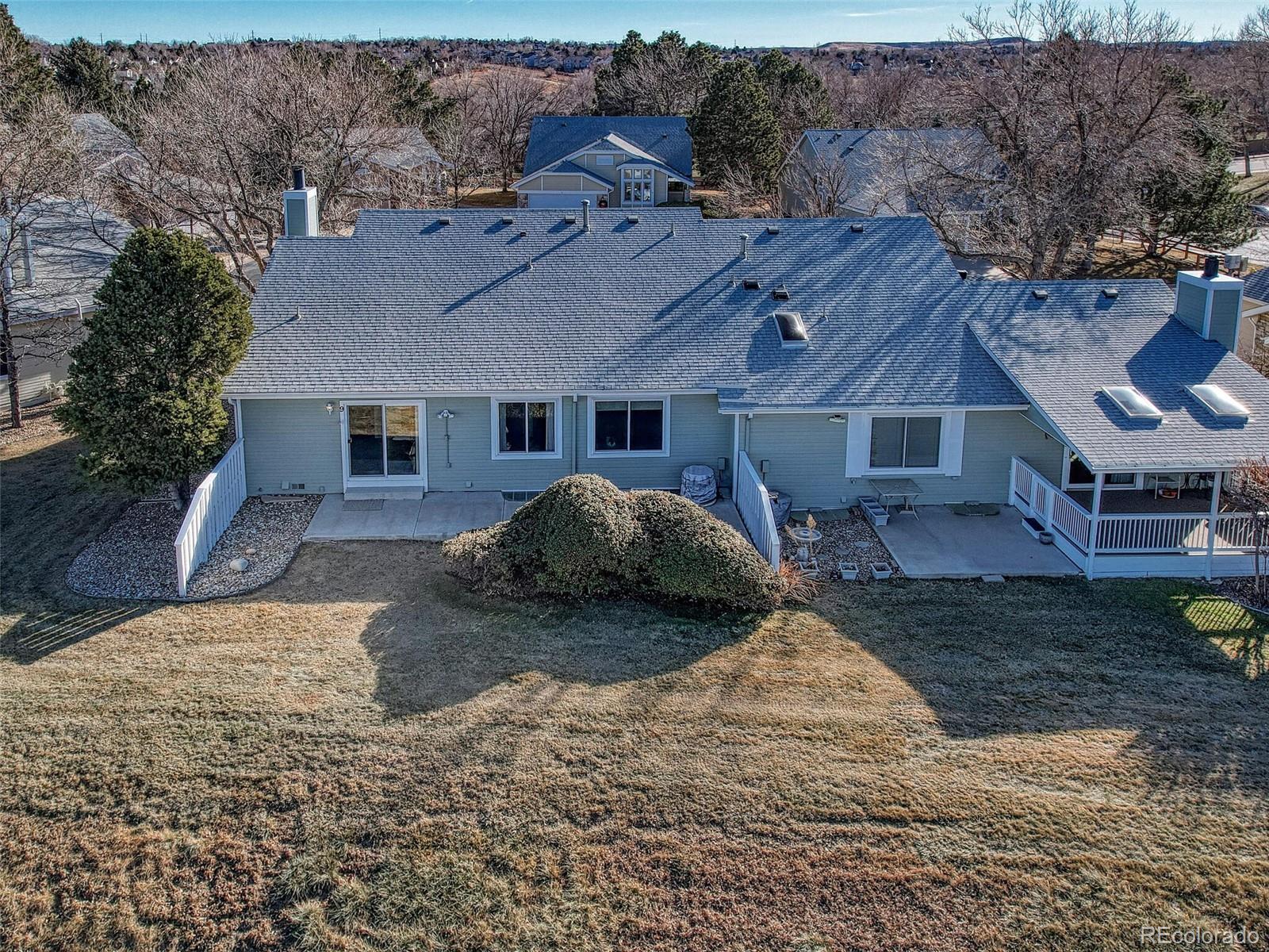 9 Stonehaven Court Highlands Ranch, CO 80130 - Photo 35 of 40 a view of a house with a yard