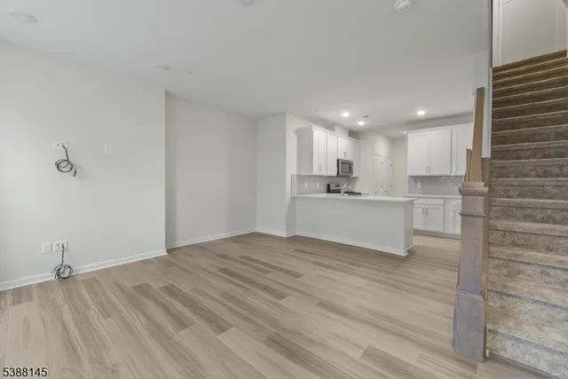 a view of kitchen with wooden floor
