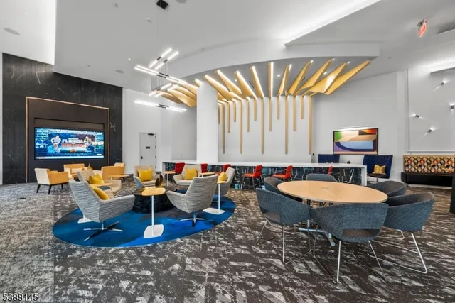 a kitchen with a large window and a table in it