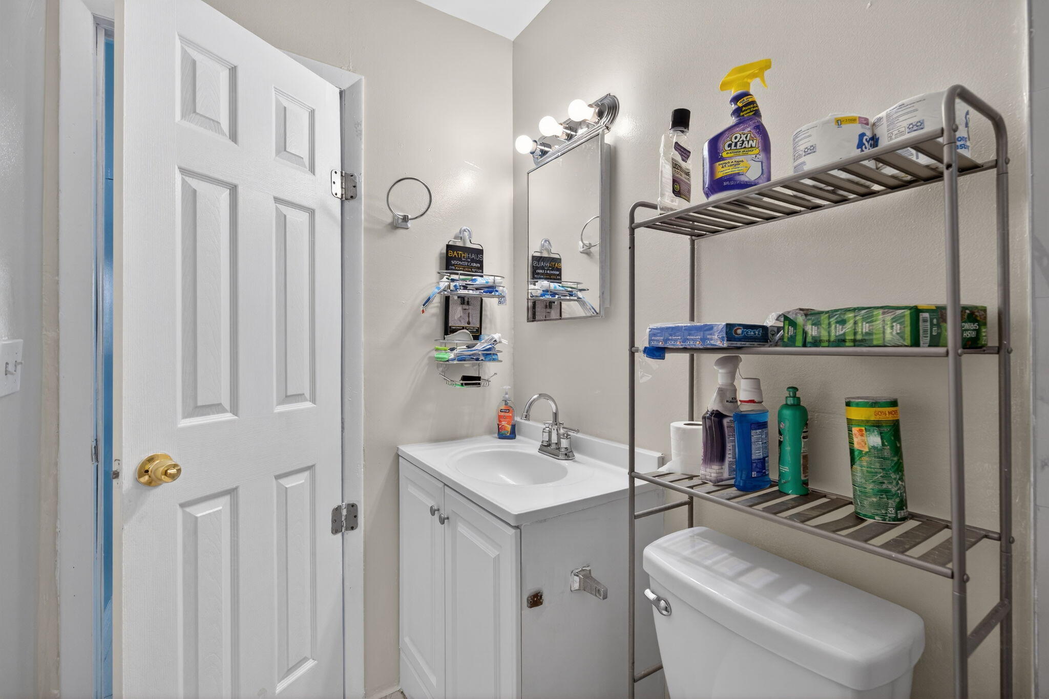 304 Kennedy Street Jupiter, FL 33458 - Photo 12 of 32 a bathroom with a sink and a mirror
