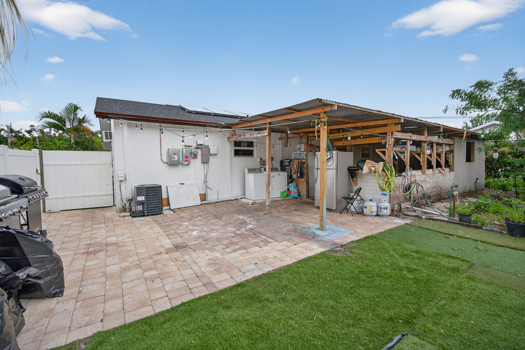 304 Kennedy Street Jupiter, FL 33458 - Photo 18 of 32 a view of a house with patio