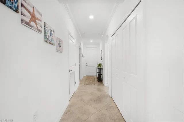 a view of a hallway with white walls