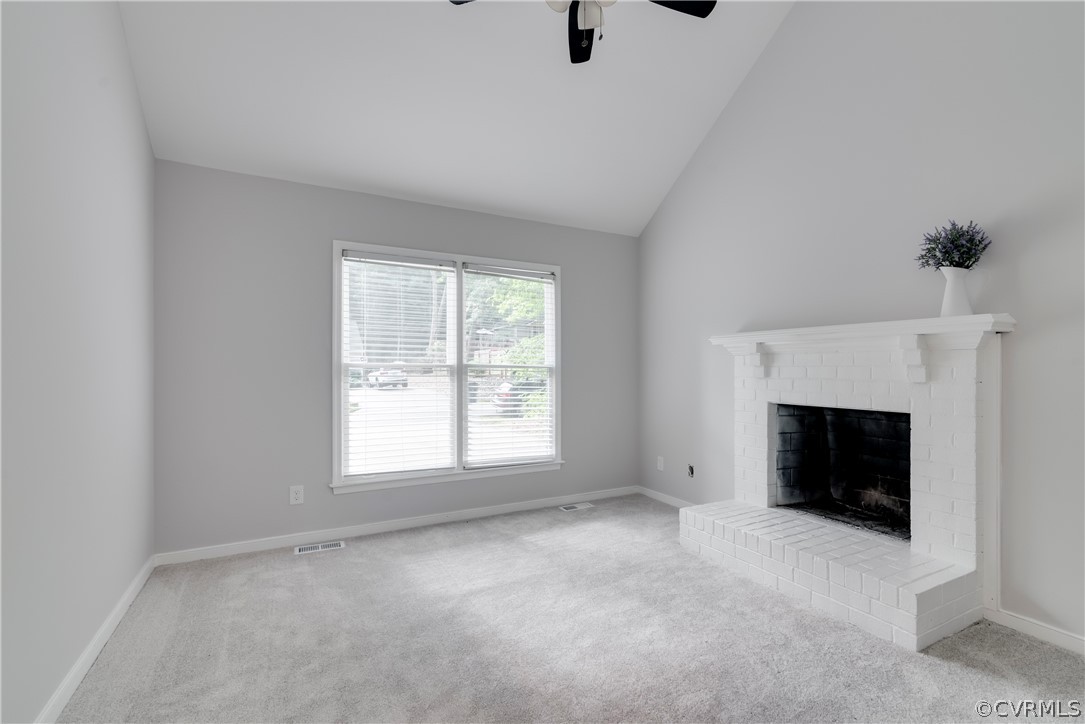 2618 Brookforest Road Midlothian, VA 23112 - Photo 13 of 29 a view of an empty room with a fireplace and a window