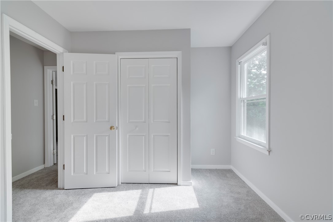 2618 Brookforest Road Midlothian, VA 23112 - Photo 20 of 29 a view of an empty room with windows