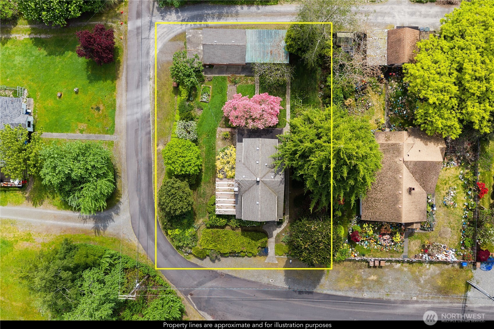 5704 North Ruby Street Tacoma, WA 98407 - Photo 35 of 38 an aerial view of a house with a yard and lake view