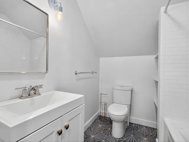 a car parked in front of a house