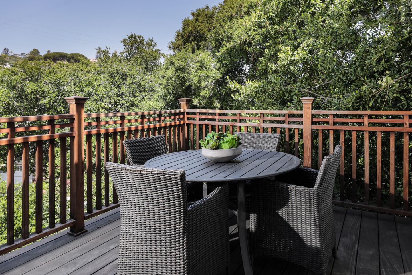 139 Windsor Drive San Carlos, CA 94070 - Photo 11 of 41 a balcony with wooden floor table and chairs