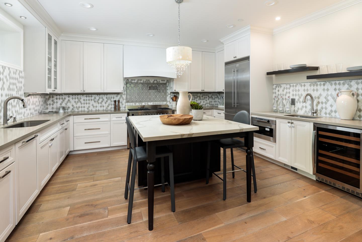 139 Windsor Drive San Carlos, CA 94070 - Photo 13 of 41 a kitchen with a sink stove and cabinets