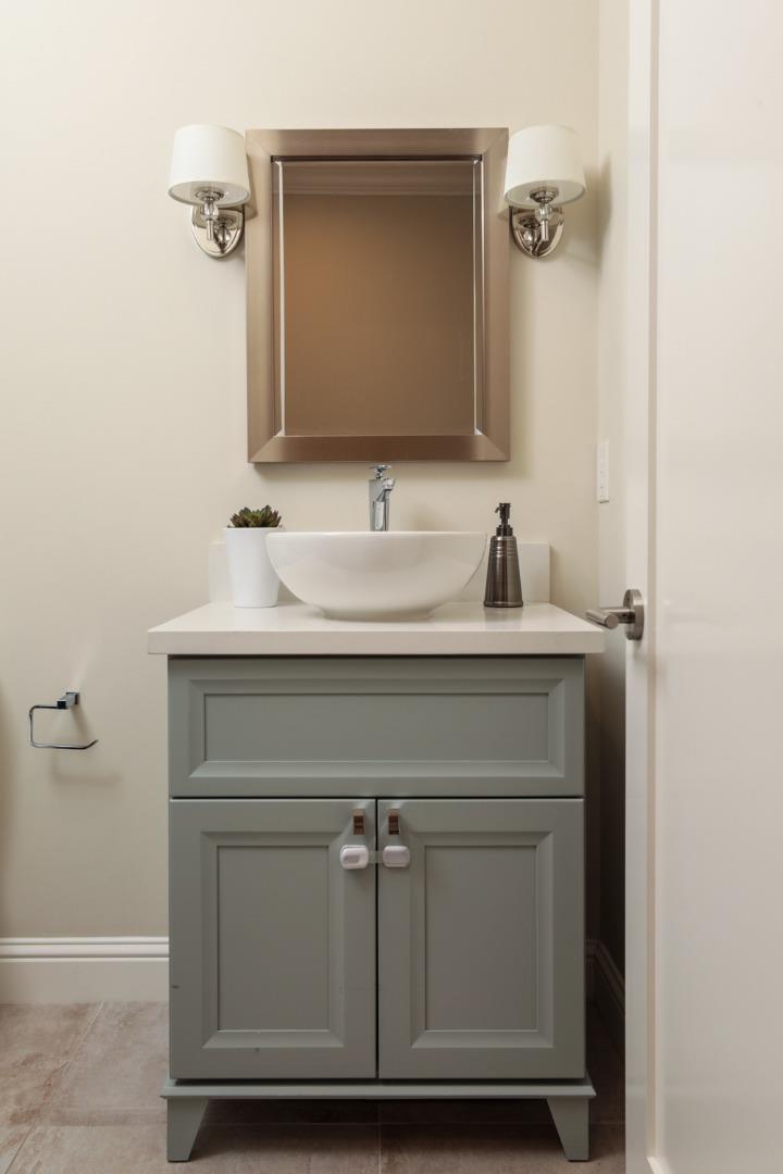 139 Windsor Drive San Carlos, CA 94070 - Photo 16 of 41 a bathroom with a sink and a mirror