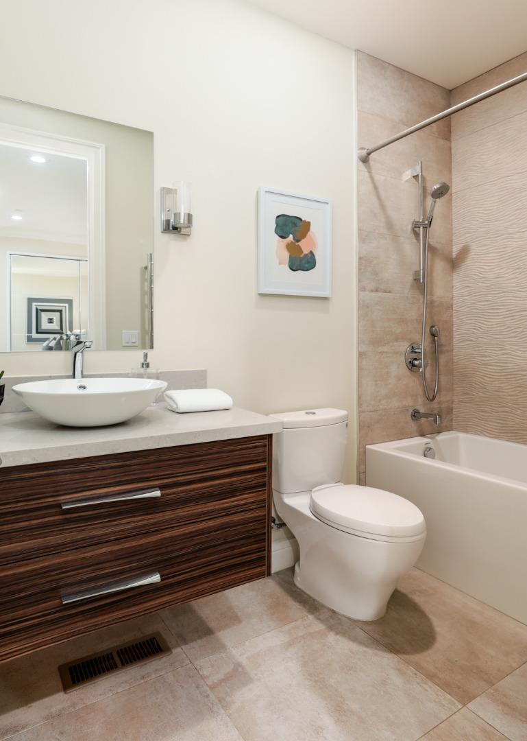 139 Windsor Drive San Carlos, CA 94070 - Photo 18 of 41 a bathroom with a sink a toilet and a bathtub