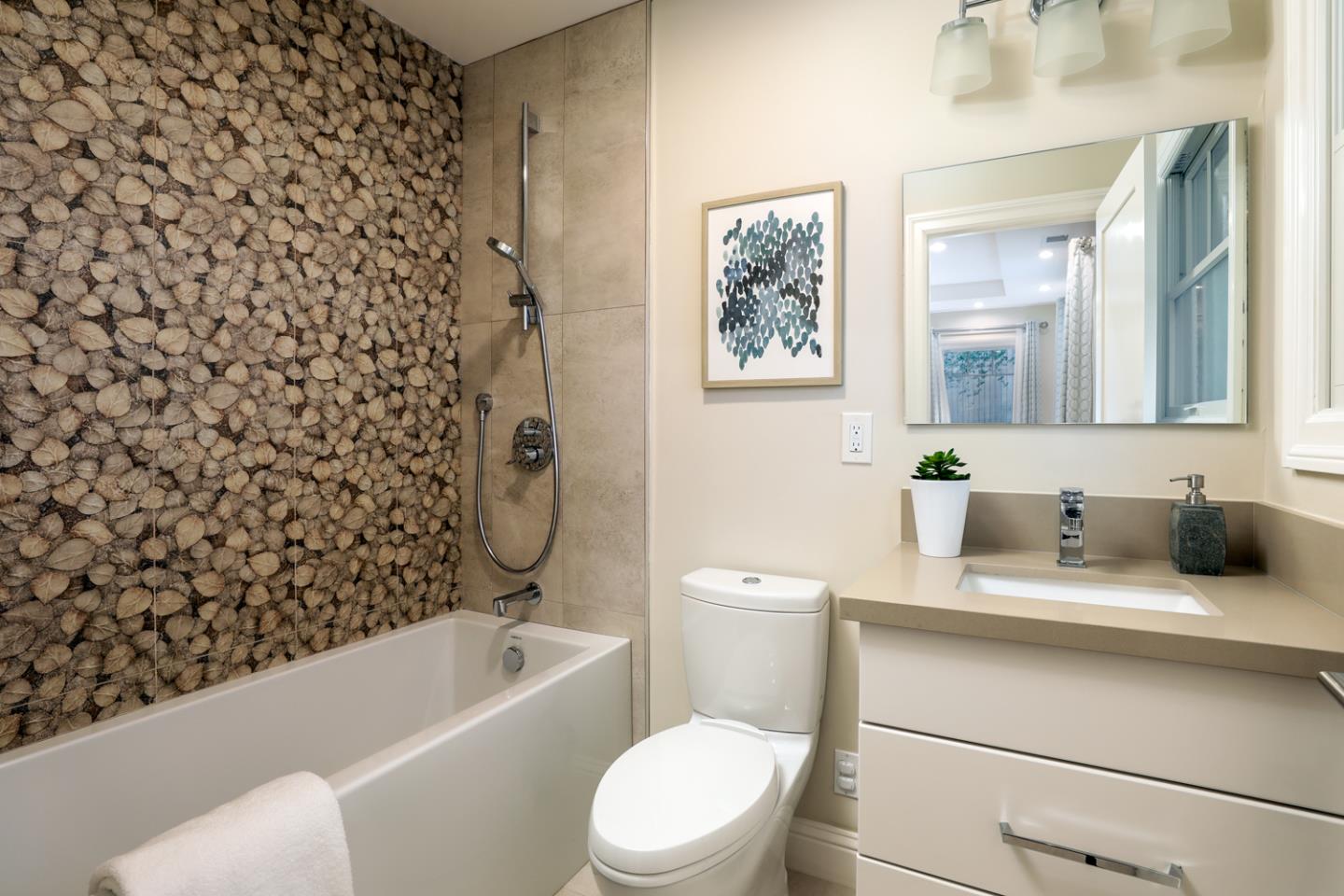 139 Windsor Drive San Carlos, CA 94070 - Photo 21 of 41 a bathroom with a sink a toilet and a bathtub