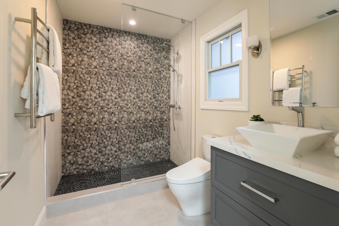 139 Windsor Drive San Carlos, CA 94070 - Photo 25 of 41 a bathroom with a sink toilet and shower