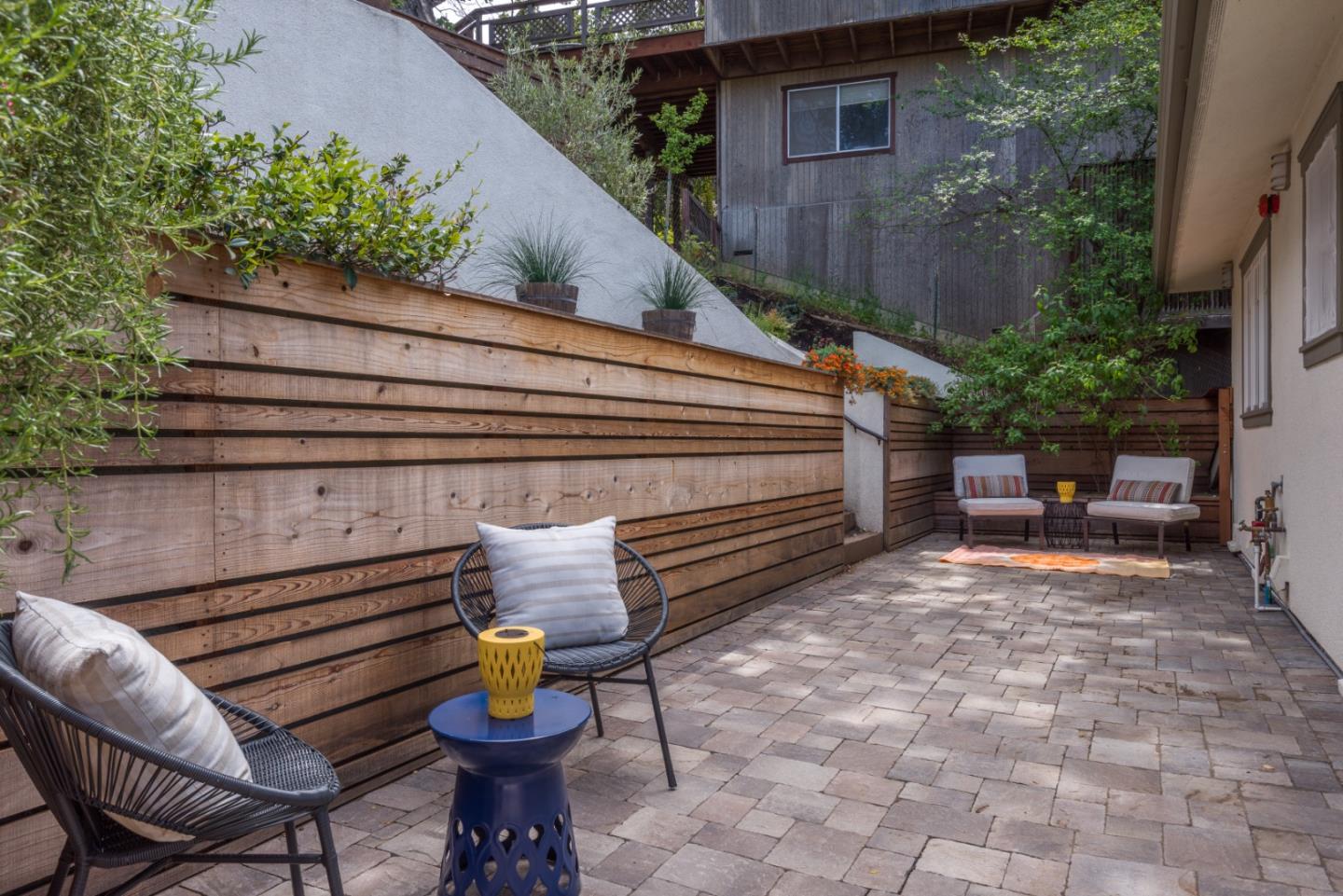 139 Windsor Drive San Carlos, CA 94070 - Photo 37 of 41 a backyard of a house with outdoor seating