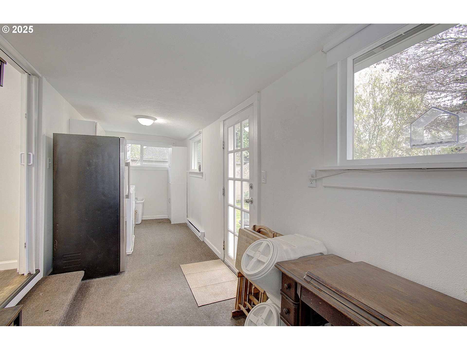 511 4th Avenue Southwest Castle Rock, WA 98611 - Photo 21 of 37 a kitchen view with wooden floor and windows