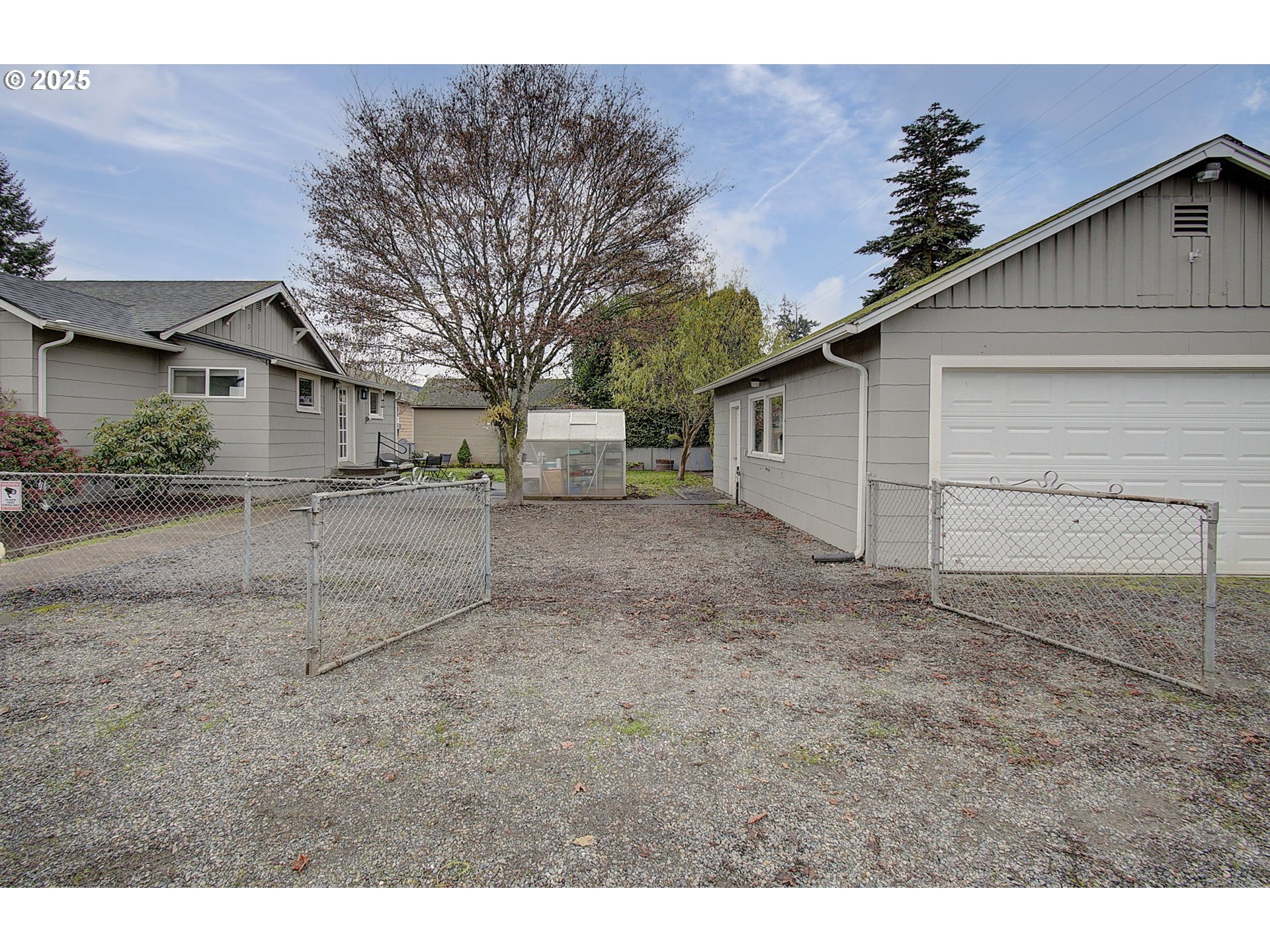 511 4th Avenue Southwest Castle Rock, WA 98611 - Photo 31 of 37 a view of a house with a yard