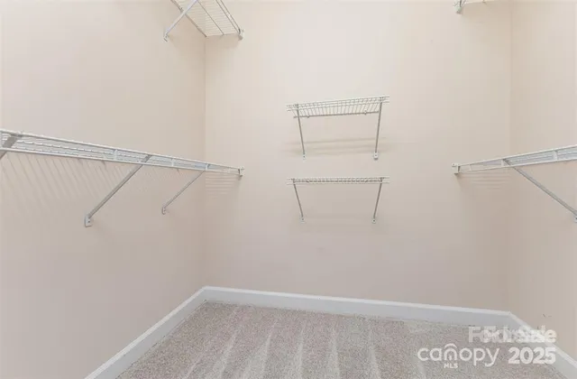 a view of a room with racks on the wall