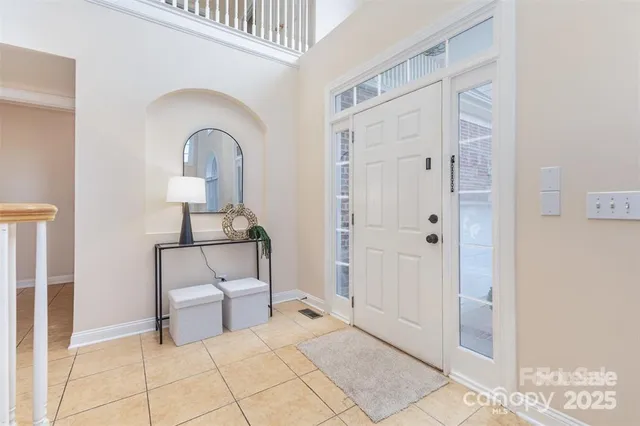 a view of a bathroom with sink and mirror