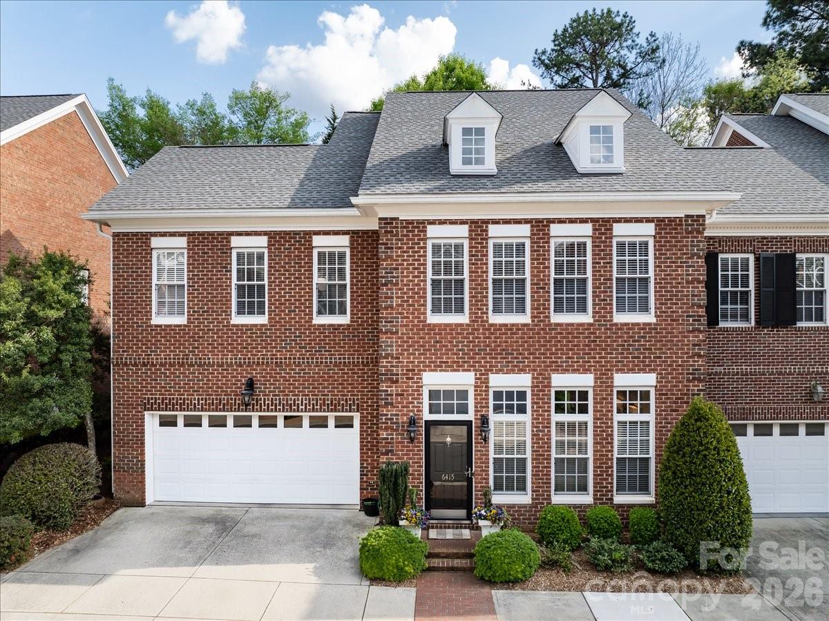 6415 Wakehurst Road Charlotte, NC 28226 - Photo 2 of 48 a front view of a house with garden