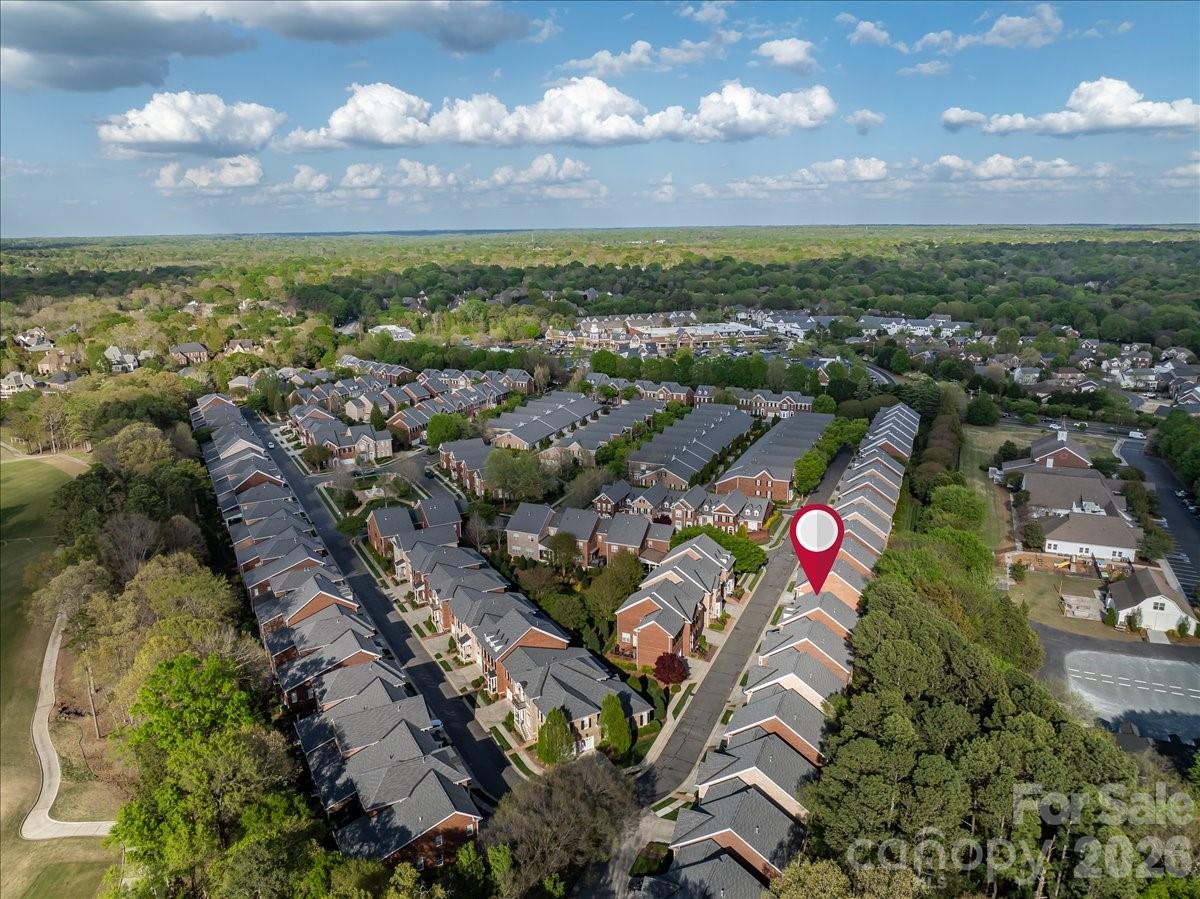 6415 Wakehurst Road Charlotte, NC 28226 - Photo 45 of 48 an aerial view of residential houses with outdoor space and seating