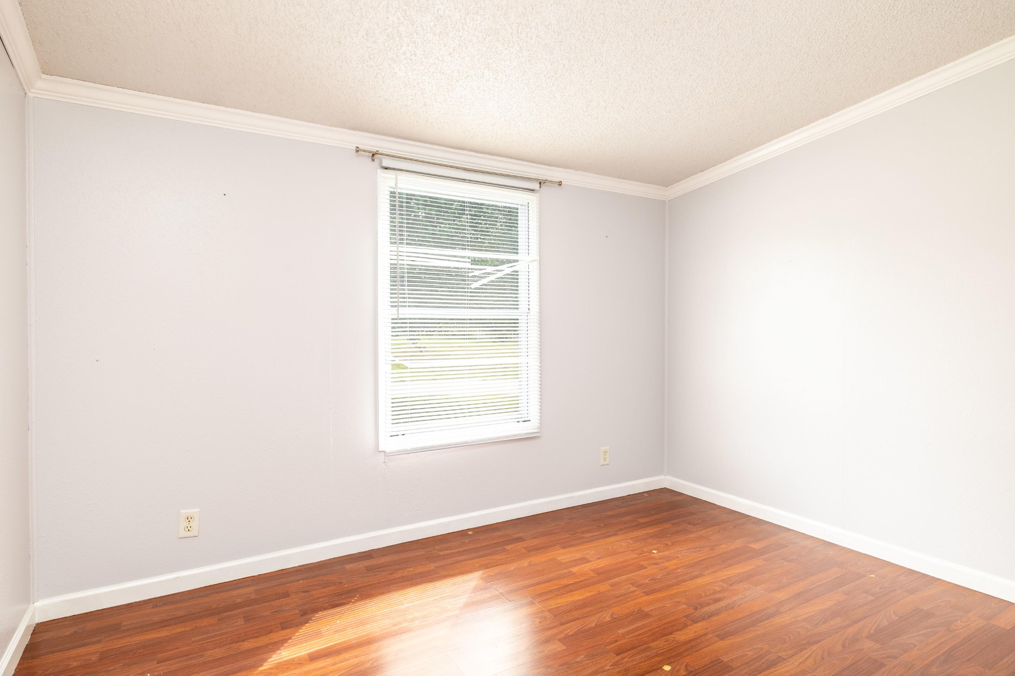 941 Ridgeview Road Maryville, TN 37801 - Photo 21 of 28 an empty room with wooden floor and windows