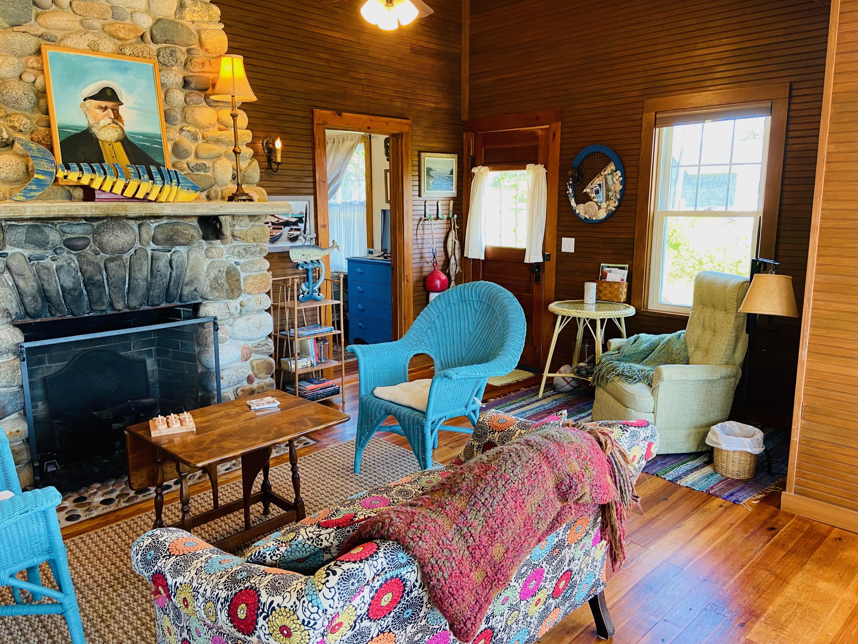 25 Corea Road Prospect Harbor, ME 04669 - Photo 9 of 30 Great room and stone fireplace