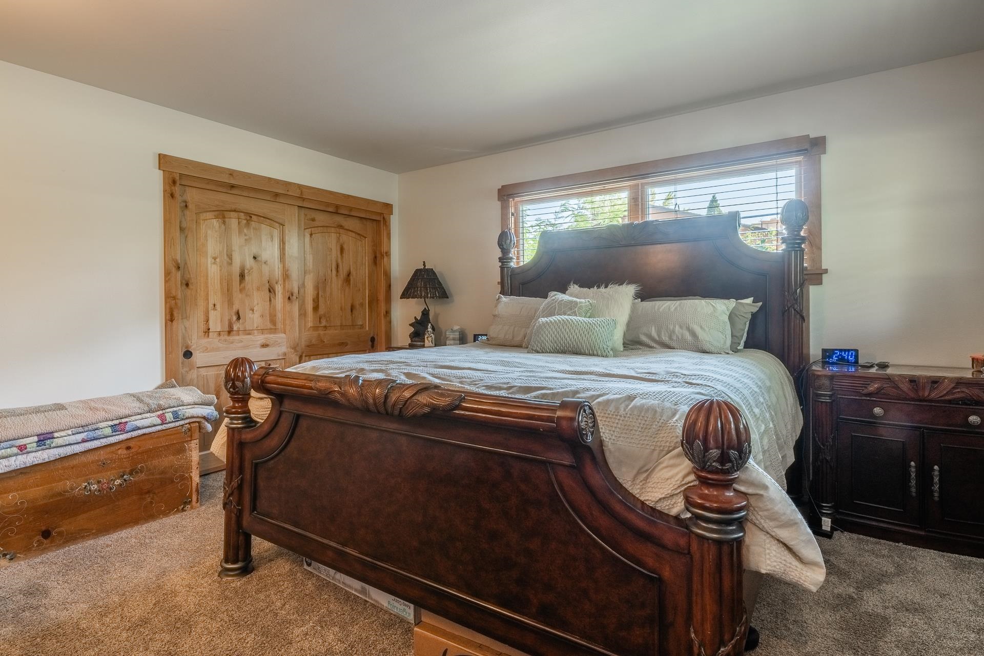 325 Mt Tom Road Bishop, CA 93514 - Photo 18 of 33 a bedroom with a bed and a dresser next to a window