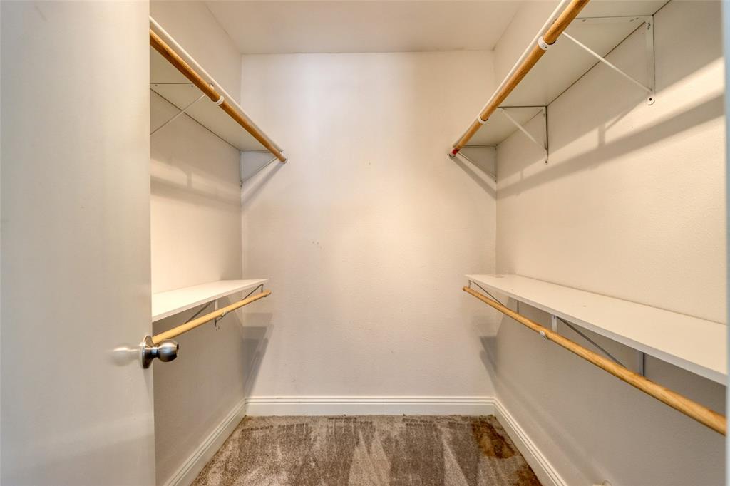 4520 Utah Avenue Dallas, TX 75216 - Photo 11 of 27 a view of a room with racks on the wall
