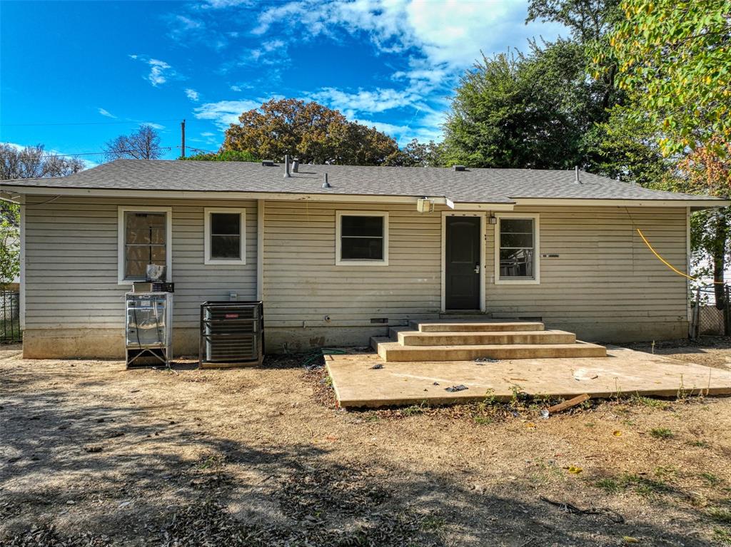 4520 Utah Avenue Dallas, TX 75216 - Photo 27 of 27 a view of house with backyard and trees in the background