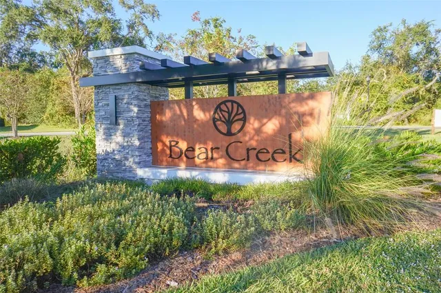 a sign that is on the side of the building