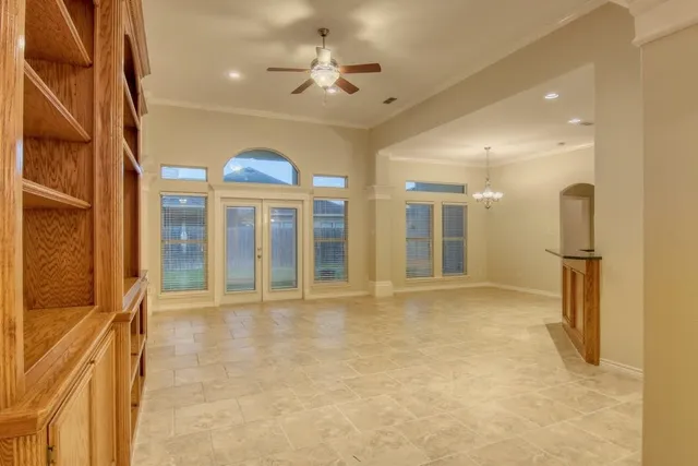 a view of an entryway with a chandelier