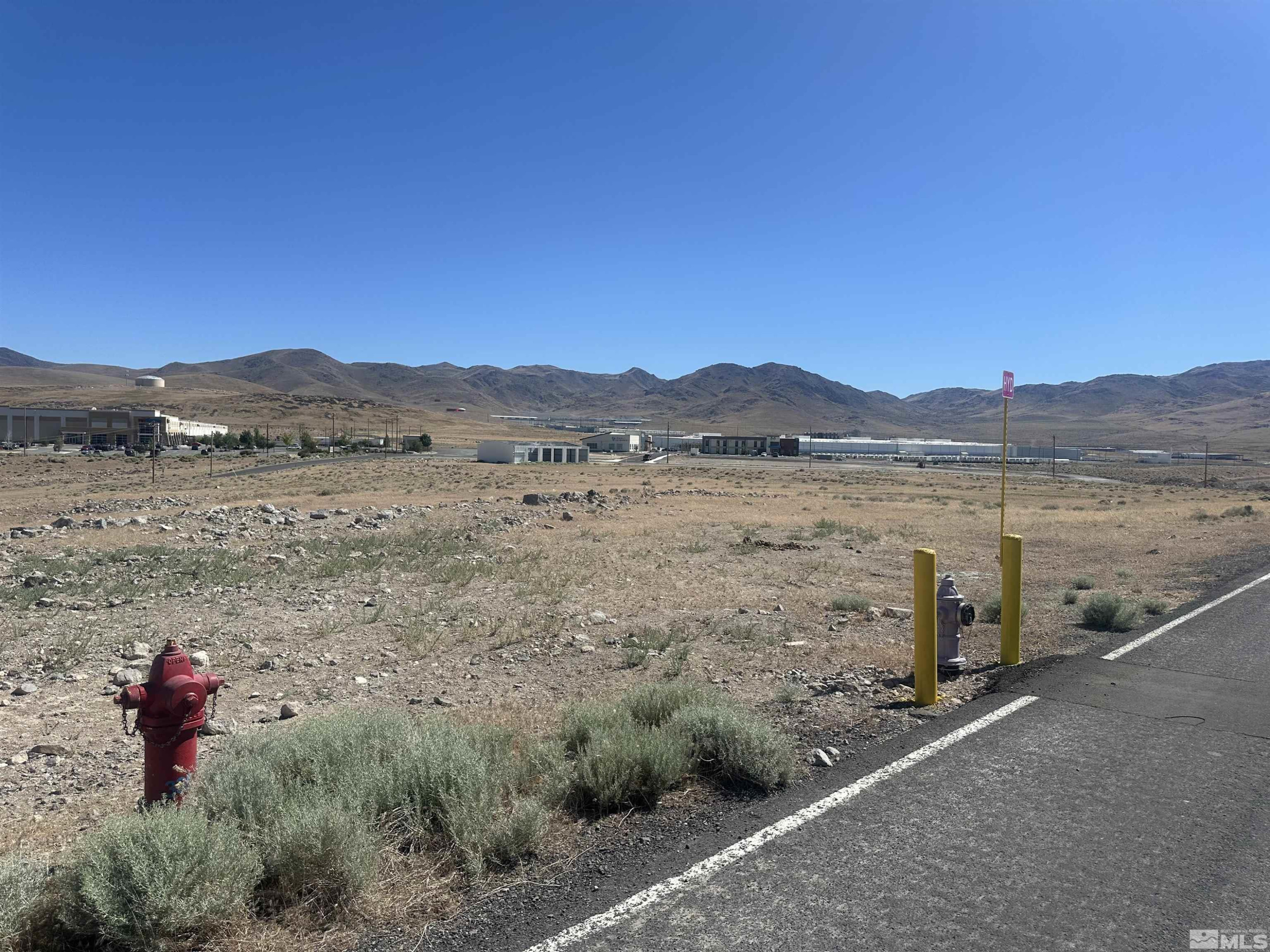 1333 Venice Drive Sparks, NV 89437 - Photo 28 of 40 a view of a lake with mountains in the background