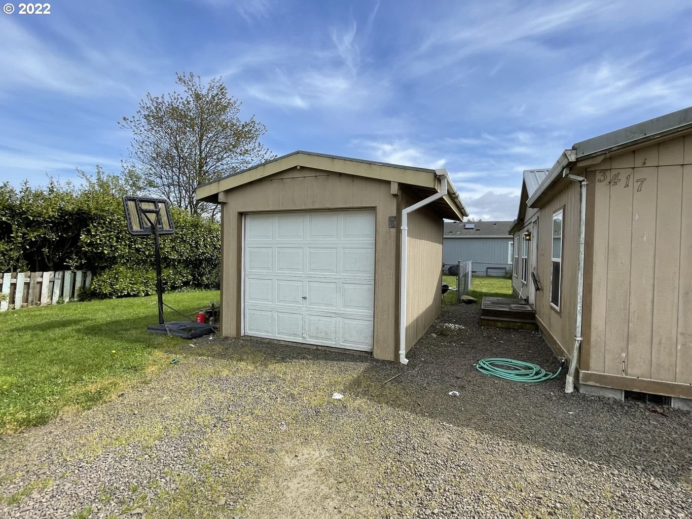 3413 Maple Lane Tillamook, OR 97141 - Photo 26 of 32 a house with trees in the background