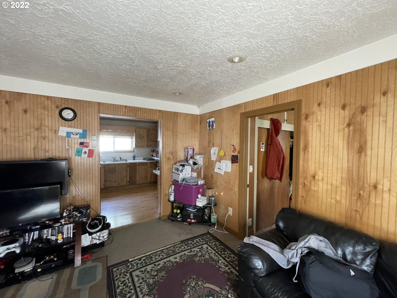 3413 Maple Lane Tillamook, OR 97141 - Photo 29 of 32 a bedroom with furniture and a window