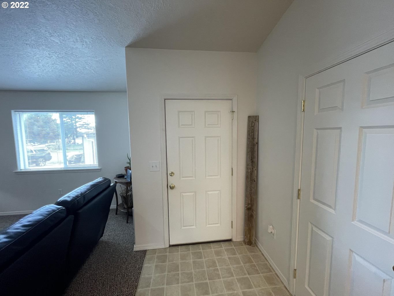 3413 Maple Lane Tillamook, OR 97141 - Photo 7 of 32 a view of a hallway with windows