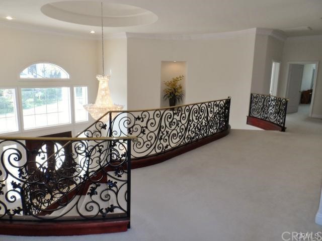 3068 Windmill Drive Diamond Bar, CA 91765 - Photo 12 of 35 a view of a hallway with wooden floor