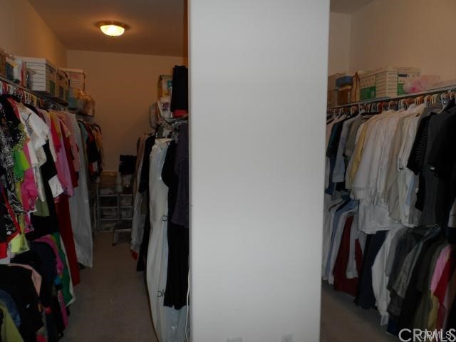 3068 Windmill Drive Diamond Bar, CA 91765 - Photo 19 of 35 a view of walk in closet with clothes and shoes