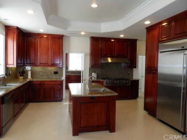 3068 Windmill Drive Diamond Bar, CA 91765 - Photo 26 of 35 a kitchen with a refrigerator sink and stove
