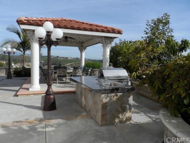 3068 Windmill Drive Diamond Bar, CA 91765 - Photo 27 of 35 a living room with furniture and a potted plant